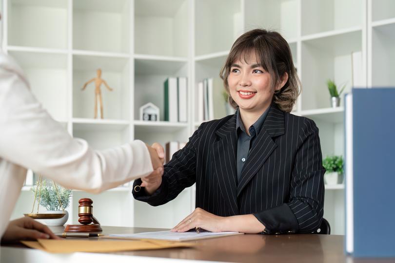 Legal consultant discussing wills with a client