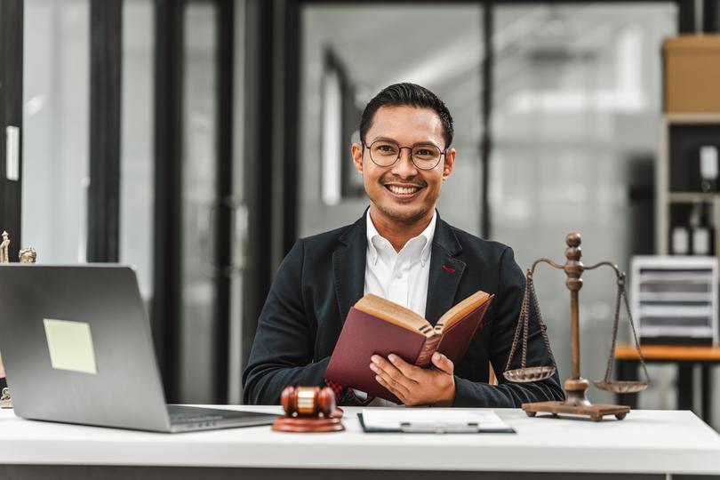 An employment lawyer discussing a case with a client