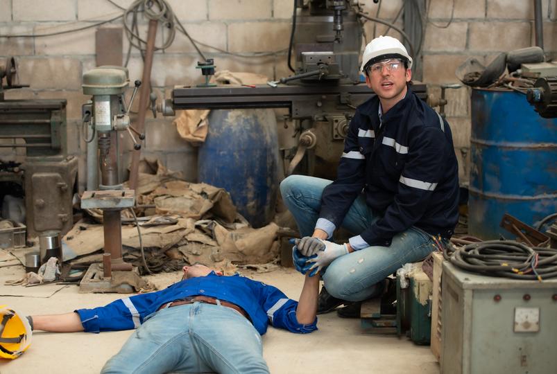 Legal professional discussing a workplace injury case with a client
