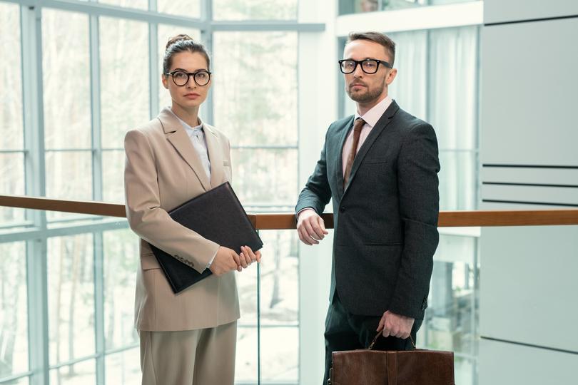 An employment lawyer discussing a case with a client