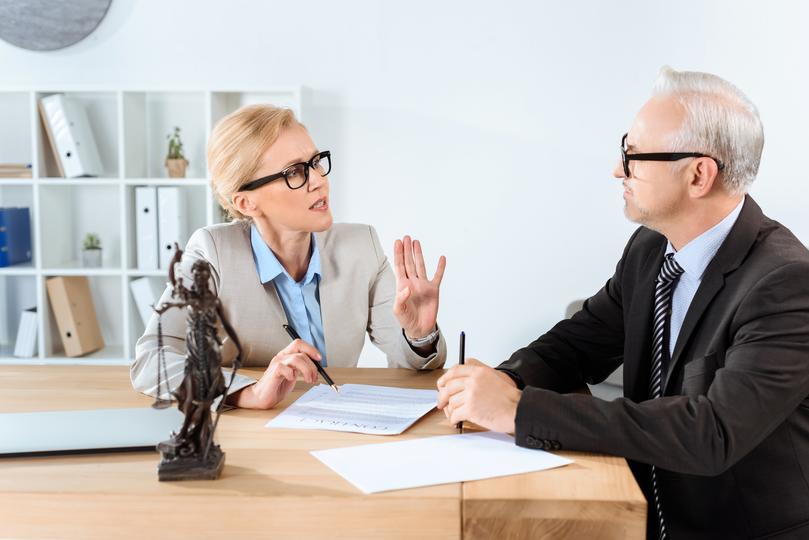 A solicitor consulting with a worker injured on the job