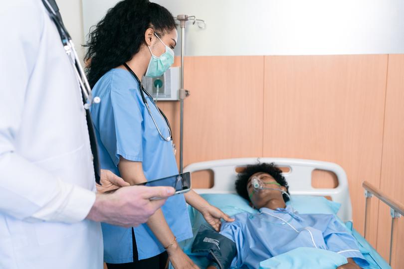 Professional solicitor advising a client on a medical negligence case