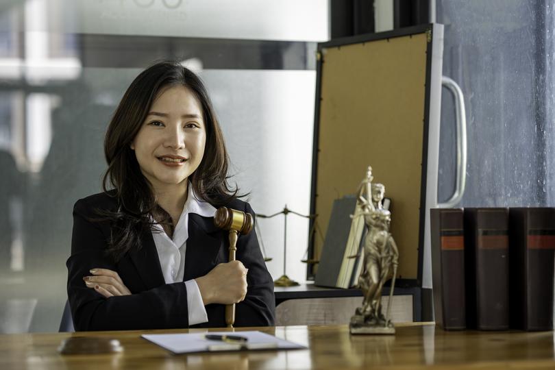 A confident probate solicitor discussing plans with a client