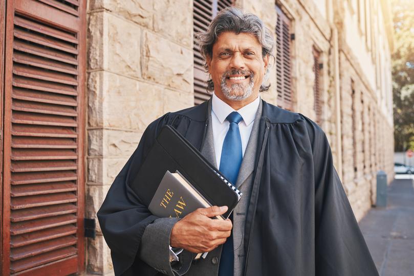 An employment lawyer discussing a case with a client